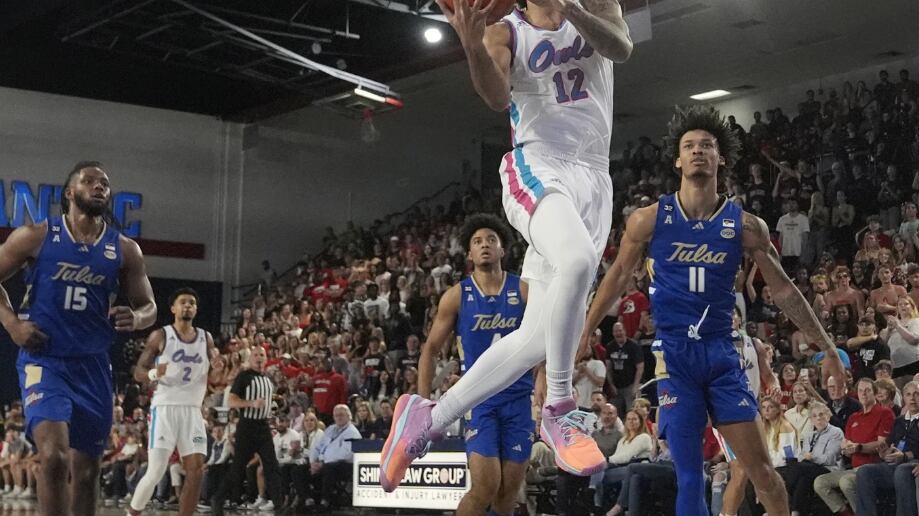 Florida Atlantic guard Jalen Gaffney (12) drives to the basket during the first half of an NCAA college basketball game against Tulsa, Saturday, Feb. 3, 2024, in Boca Raton, Fla. (AP Photo/Marta Lavandier)