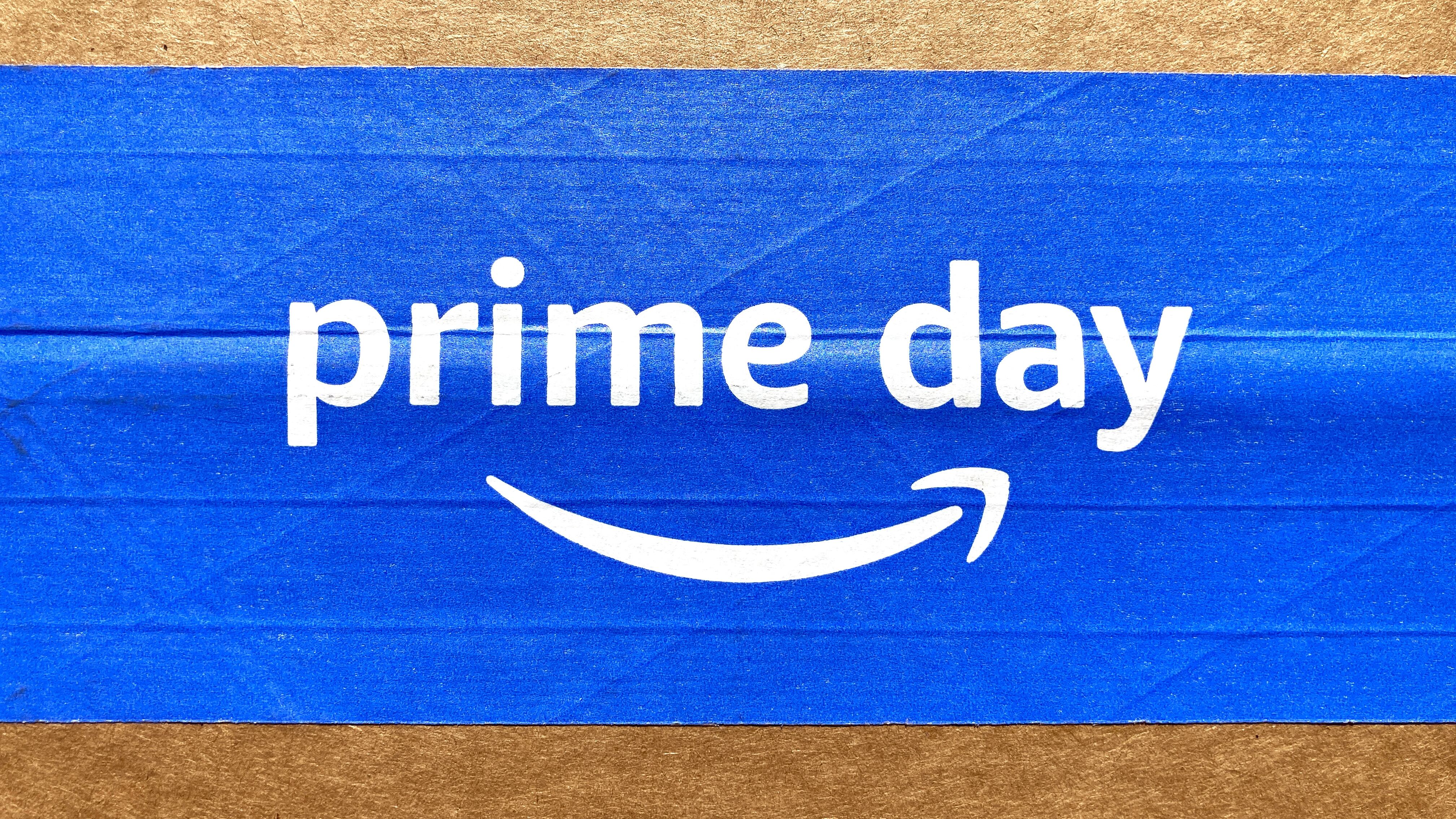 Amazon Prime Day sign, logo on blue tape of cardboard box advertises annual deal event exclusively for Amazon.com Prime members. - Seattle, Washington, USA - 2022