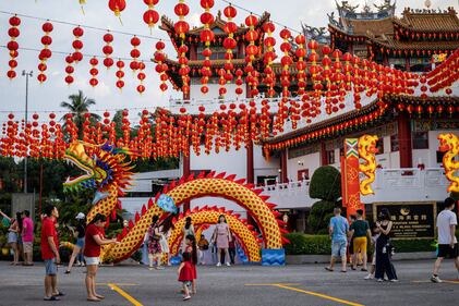 KUALA LUMPUR, MALAYSIA - FEBRUARY 09: People arrive at the Lunar New Year celebration at Thean Hou Temple on February 09, 2024, in Kuala Lumpur, Malaysia. Chinese New Year in Malaysia is marked by family gatherings, festive adornments and traditional rituals embodying a spirit of hope and renewal for the year ahead, and aims to bring joy and prosperity to all while fostering a sense of unity and hope for a successful Year of the Dragon. (Photo by Annice Lyn/Getty Images)