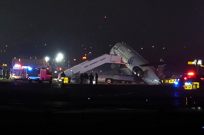 Air Canada flight collides with a Port Authority vehicle at New York's LaGuardia Airport