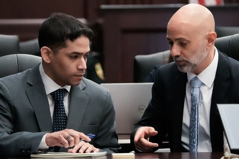 Defendant Mario Fernandez Saldana, left, talks with his Defense Attorney James Hill, before the start of jury selection in his murder trial Monday morning, August 10, 2026 in the Duval County Courthouse in Jacksonville, Fla. [Doug Engle/Florida Times-Union]