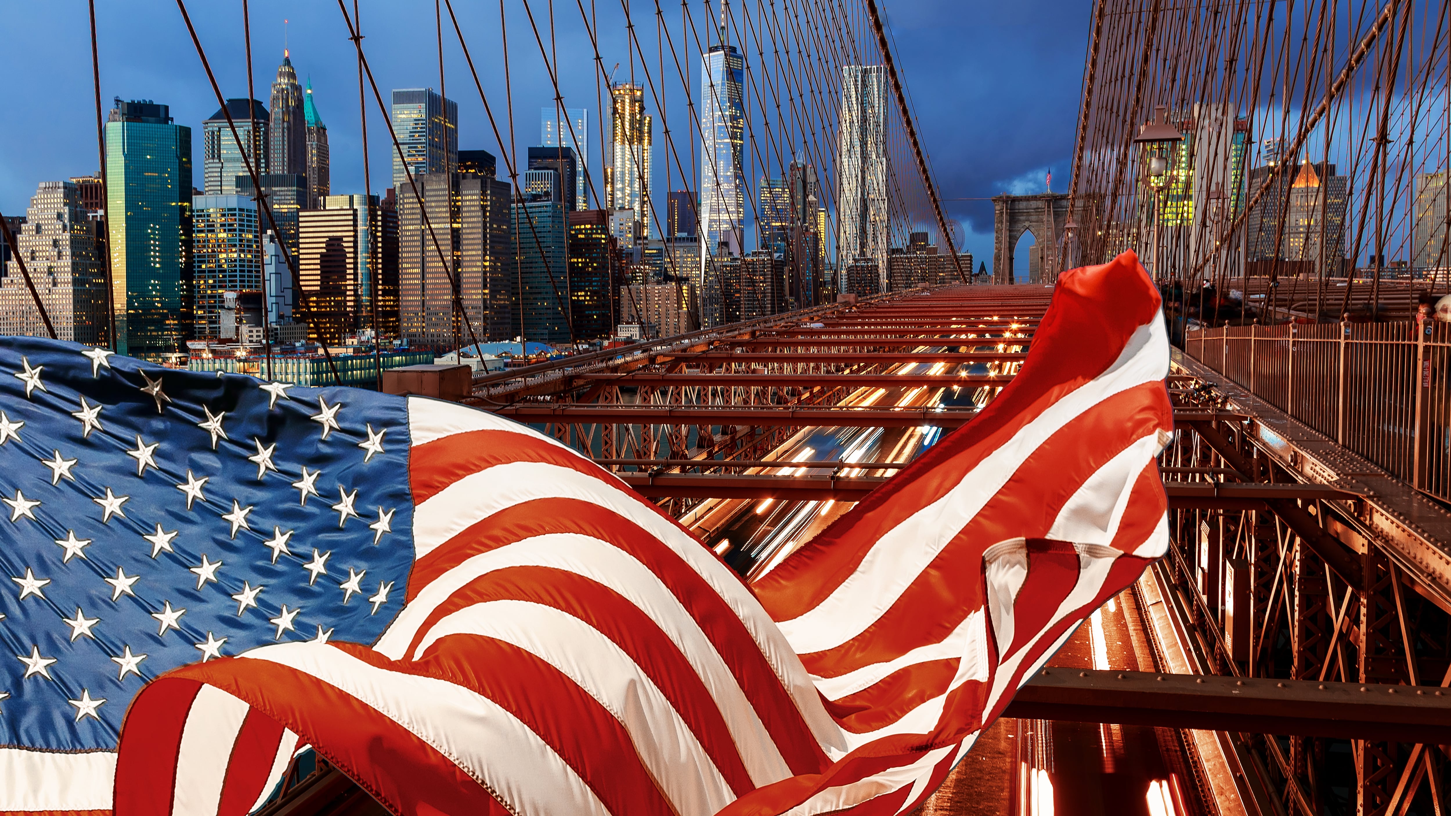 American flag at night with car traffic night Brooklyn Bridge