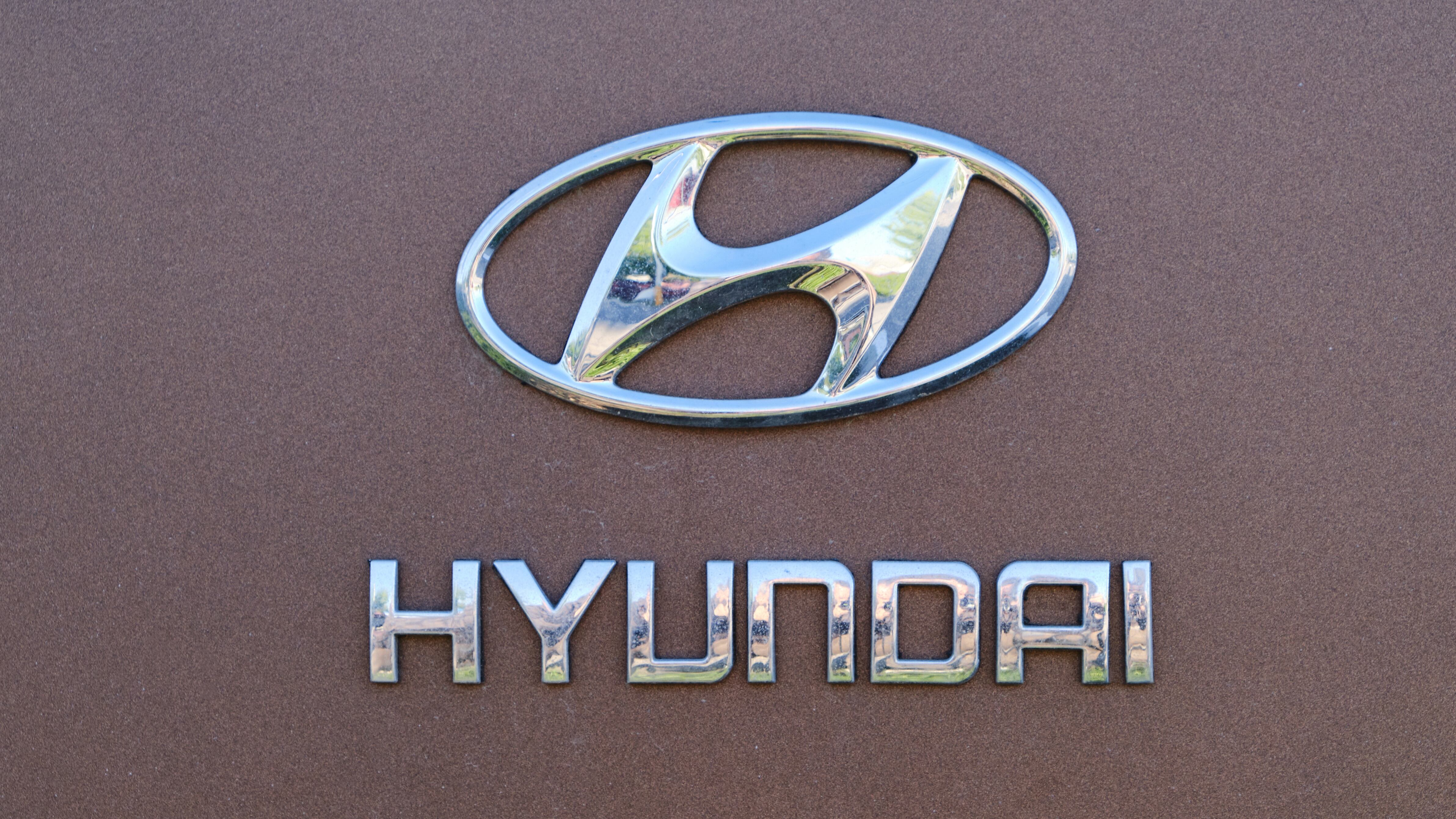 Hyundai logo on a cherry background