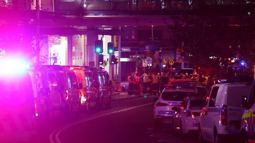 BONDI JUNCTION, AUSTRALIA - APRIL 13: NSW police and ambulance vehicles line the street outside Westfield Bondi Junction on April 13, 2024 in Bondi Junction, Australia. Six victims, plus the offender, are confirmed dead following an incident at Westfield Shopping Centre in Bondi Junction, Sydney. (Photo by Lisa Maree Williams/Getty Images)