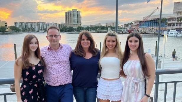 Marie Fratta (center, with her family) is the winner of the Anastasia Island 2024 HGTV Dream Home.