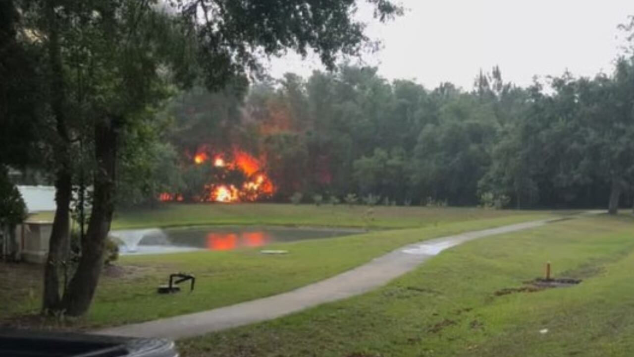 A screen grab from a viewer video shows the aftermath of a plane crash in Yulee on May 10, 2025.