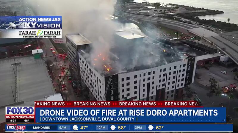 Jacksonville Fire and Rescue Department firefighters have been fighting a fire at the still-under-construction Rise Doro apartments in Downtown Jacksonville since Sunday night.