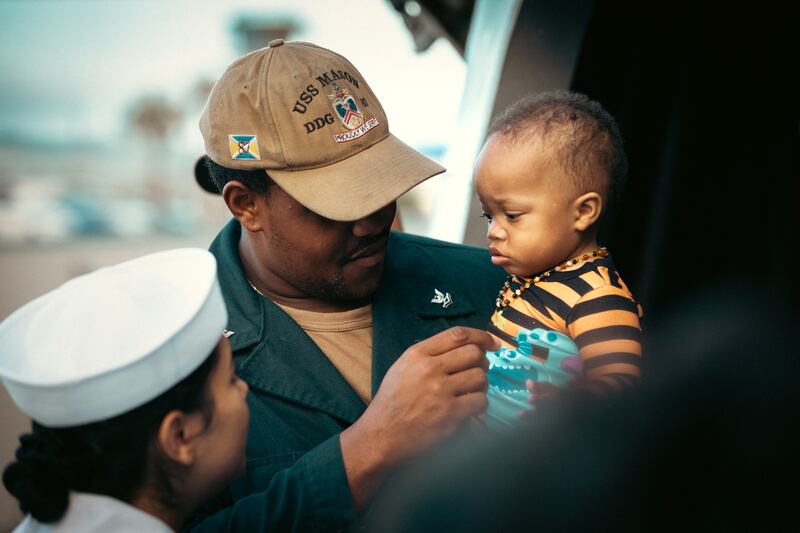 Sailor shares love with his son before departing from Naval Station Mayport.