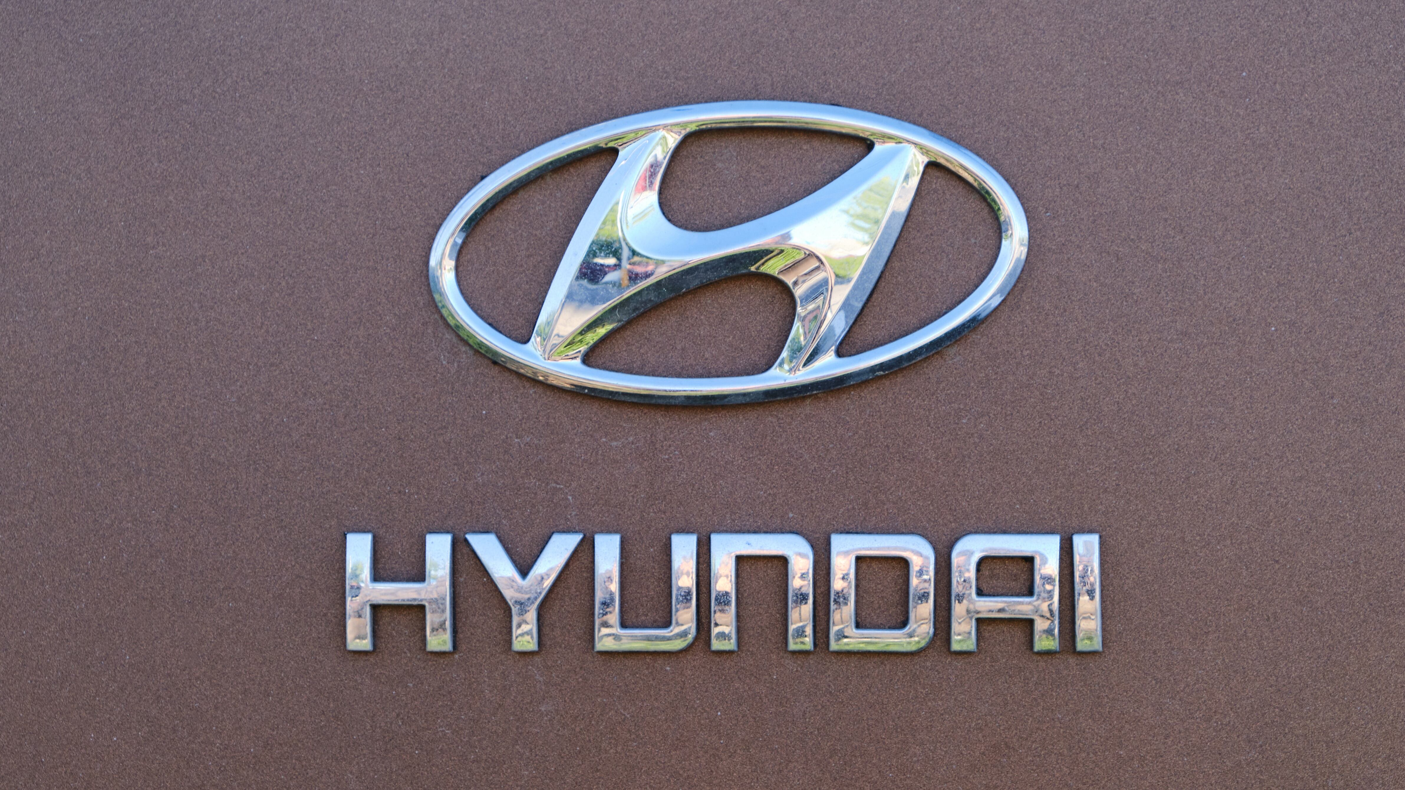 Hyundai logo on a cherry background