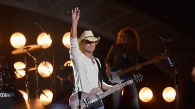NASHVILLE, TN - DECEMBER 15: Honoree Kenny Chesney performs onstage during the 2014 American Country Countdown Awards at Music City Center on December 15, 2014 in Nashville, Tennessee. (Photo by Jason Merritt/Getty Images for dcp)