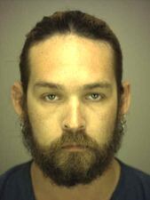 Justin Mullins is charged with second degree murder following a reported road rage shooting in Palatka