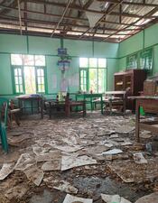 A room of a high school is seen filled with debris after it was allegedly hit by an airstrike by the military in Ohe Htein Twin village in Tabayin township, also known as Depayin in Sagaing region, Myanmar, Monday, May 12, 2025. (White Depeyin People Defence Force via AP)