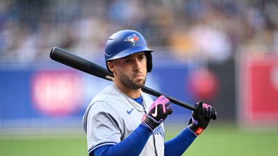SAN DIEGO, CA - APRIL 20: George Springer #4 of the Toronto Blue Jays warms- up before a baseball game against the San Diego Padres on April 20, 2024 at Petco Park in San Diego, California. (Photo by Denis Poroy/Getty Images)