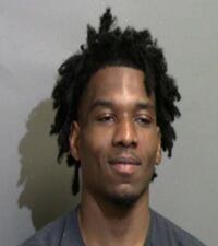 Alex Etheredge, 28, was arrested and charged in the death of Christopher Suttles.