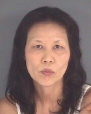 57-year-old Song Mo has been charged with prostitution/pimping/lewd or indecent act and practicing massage without a license at the Orange Spa.