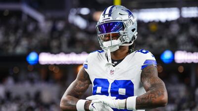 DALLAS, TX - JANUARY 14: CeeDee Lamb #88 of the Dallas Cowboys warms up prior to an NFL wild-card playoff football game against the Green Bay Packers at AT&T Stadium on January 14, 2024 in Dallas, Texas. (Photo by Cooper Neill/Getty Images)