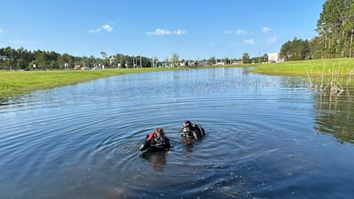 A driver was able to escape unharmed Monday, May 5, 2025 after driving into a retention pond in St. Johns County.