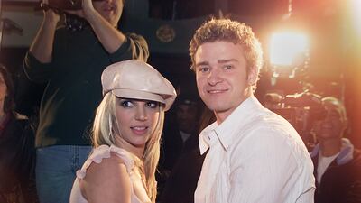 Britney Spears and boyfriend Justin Timberlake arrive at the premiere of her movie "Crossroads" at the Mann Chinese Theatre in Hollywood, Ca., Feb. 11, 2002. (photo by Kevin Winter/Getty Images)