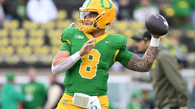 EUGENE, OR - NOVEMBER 09: Oregon Ducks quarterback Dillon Gabriel (8) warms up prior to the start of the game during a college football game between the Maryland Terrapins and Oregon Ducks on November 9, 2024, at Autzen Stadium in Eugene, Oregon. (Photo by Brian Murphy/Icon Sportswire via Getty Images)